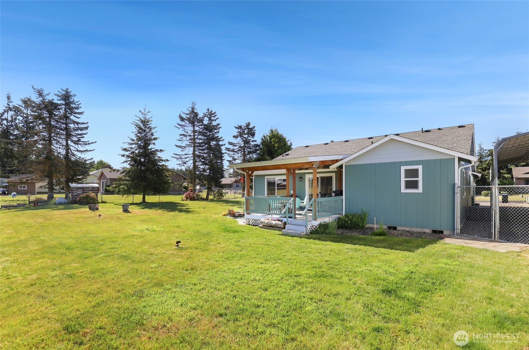 8008 188th Avenue Southwest Rochester, WA 98579 - Photo 33 of 40 a view of a house with a yard