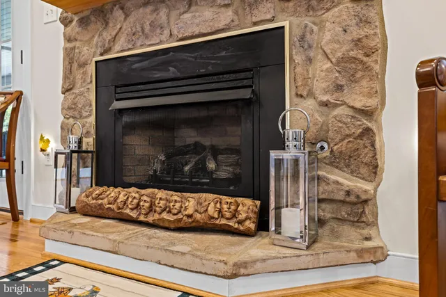 a view of a a dining room with furniture window and wooden floor