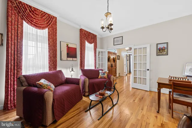 a spacious bathroom with a double vanity sink and a mirror