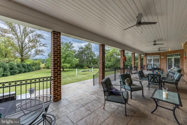 a front view of a house with stairs