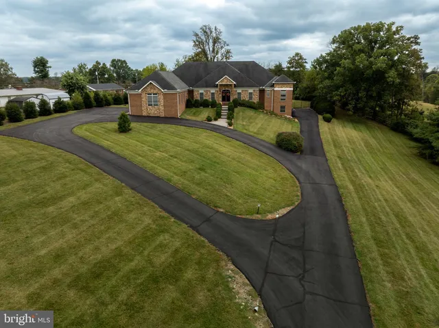 a view of a entryway door front of a house