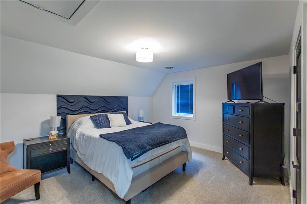 267 Reibold Road Renfrew, PA 16053 - Photo 20 of 39 a bedroom with a bed and a night stand