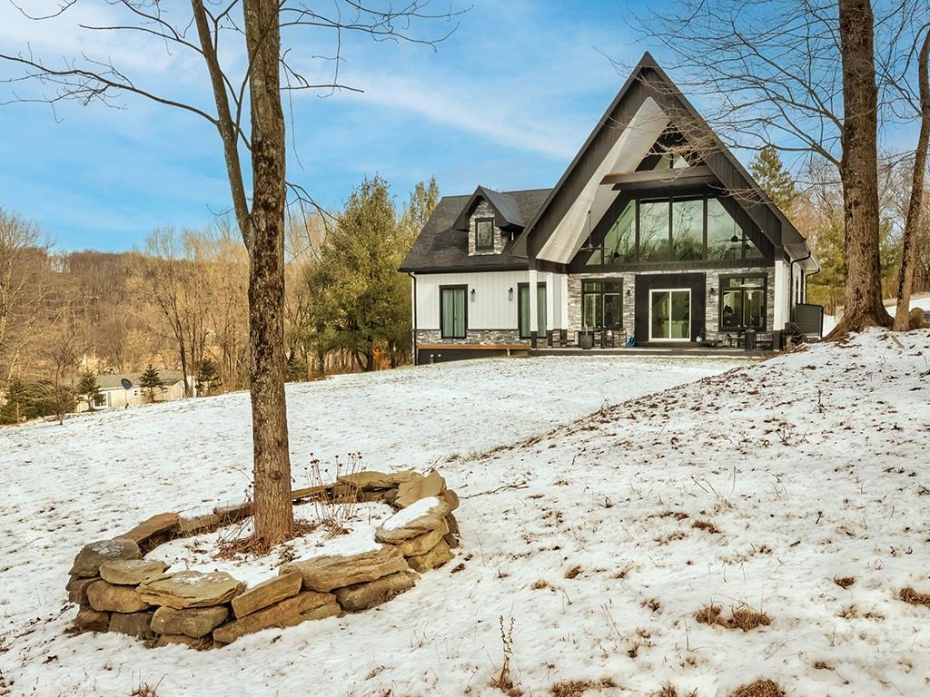 267 Reibold Road Renfrew, PA 16053 - Photo 28 of 39 a front view of a house with a yard