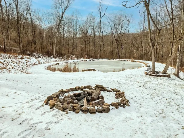 a view of snow on the side of the road