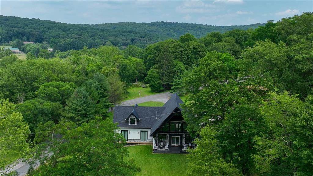 267 Reibold Road Renfrew, PA 16053 - Photo 34 of 39 an aerial view of a house with yard and outdoor seating