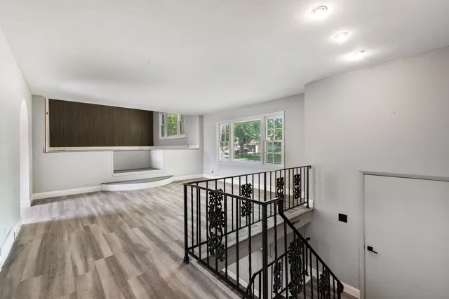 a view of entryway with wooden floor