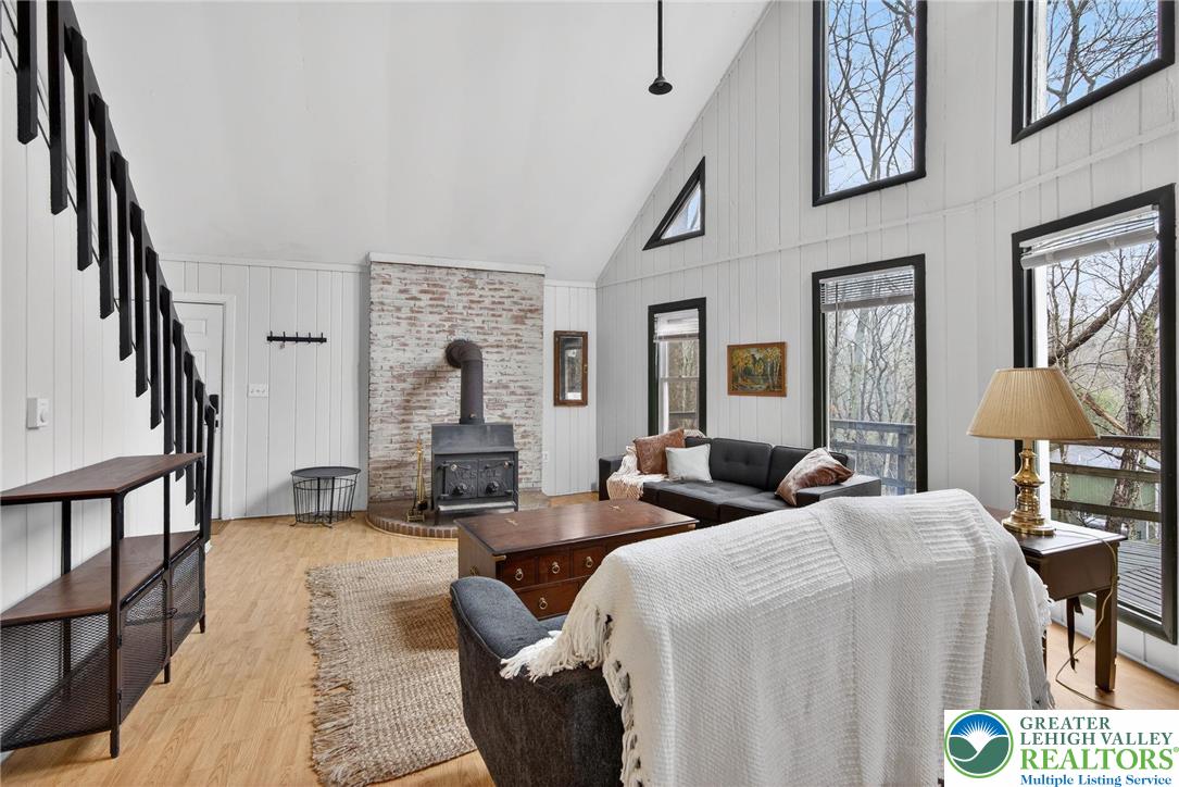 149 Regent Street Bushkill, PA 18324 - Photo 12 of 32 a living room with furniture and a lamp