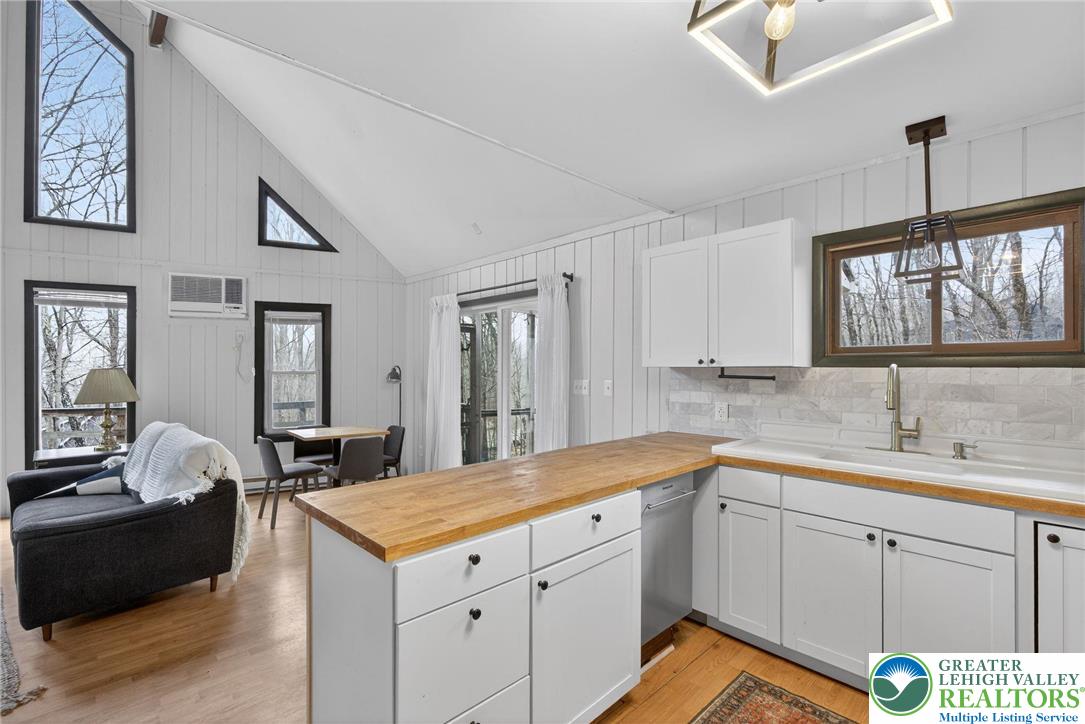 149 Regent Street Bushkill, PA 18324 - Photo 18 of 32 a kitchen that has a sink and a stove in it