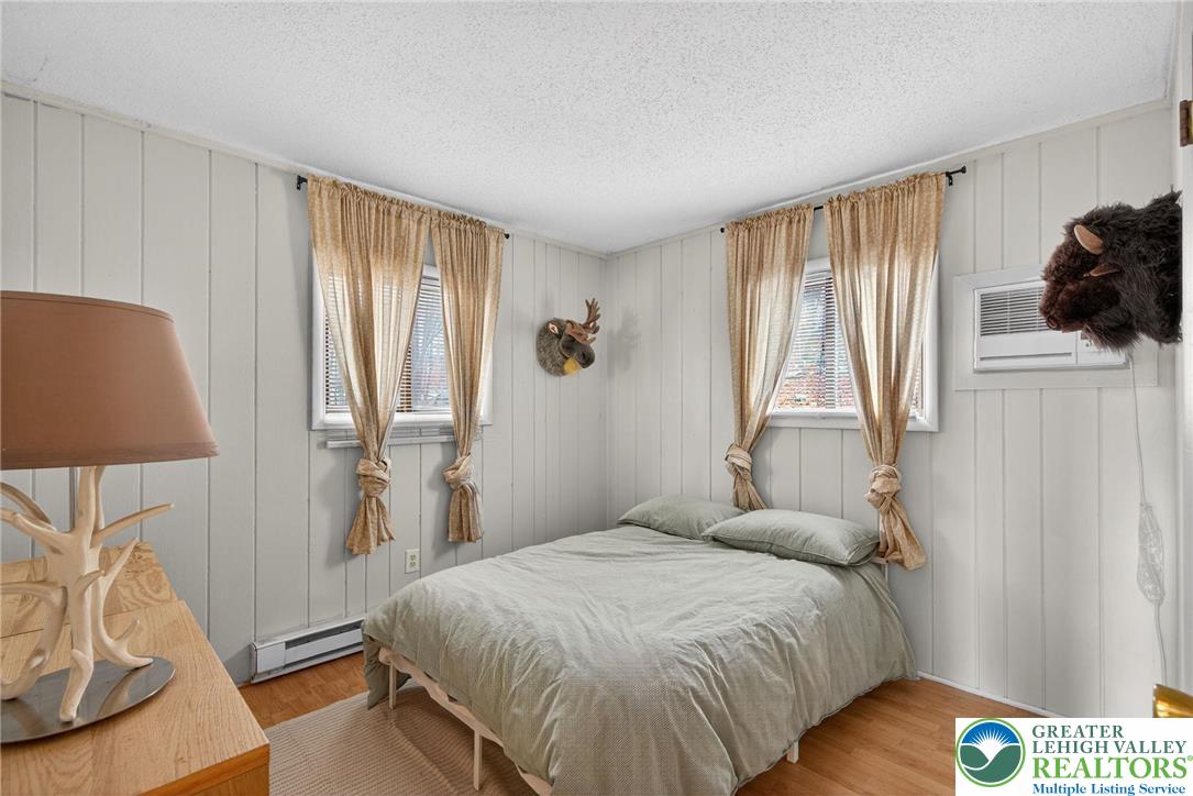 149 Regent Street Bushkill, PA 18324 - Photo 20 of 32 a bedroom with a bed and a window