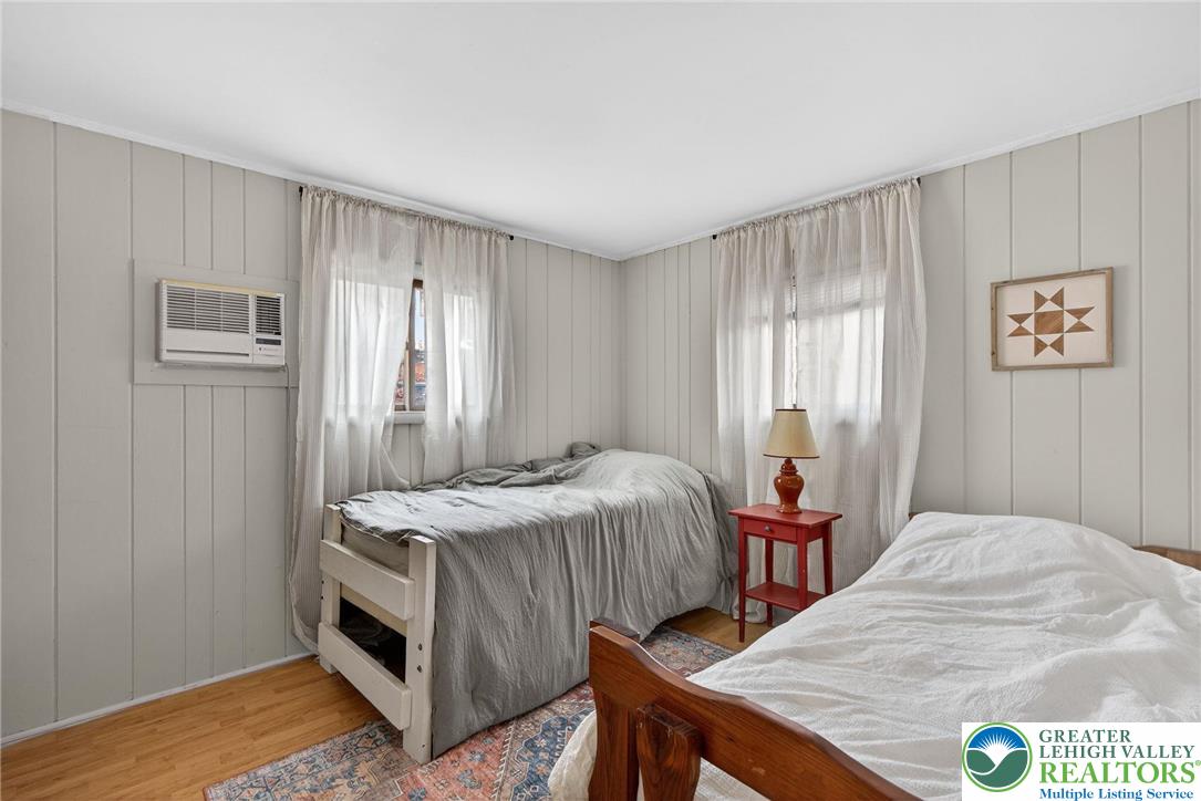 149 Regent Street Bushkill, PA 18324 - Photo 21 of 32 a bedroom with a bed and a table