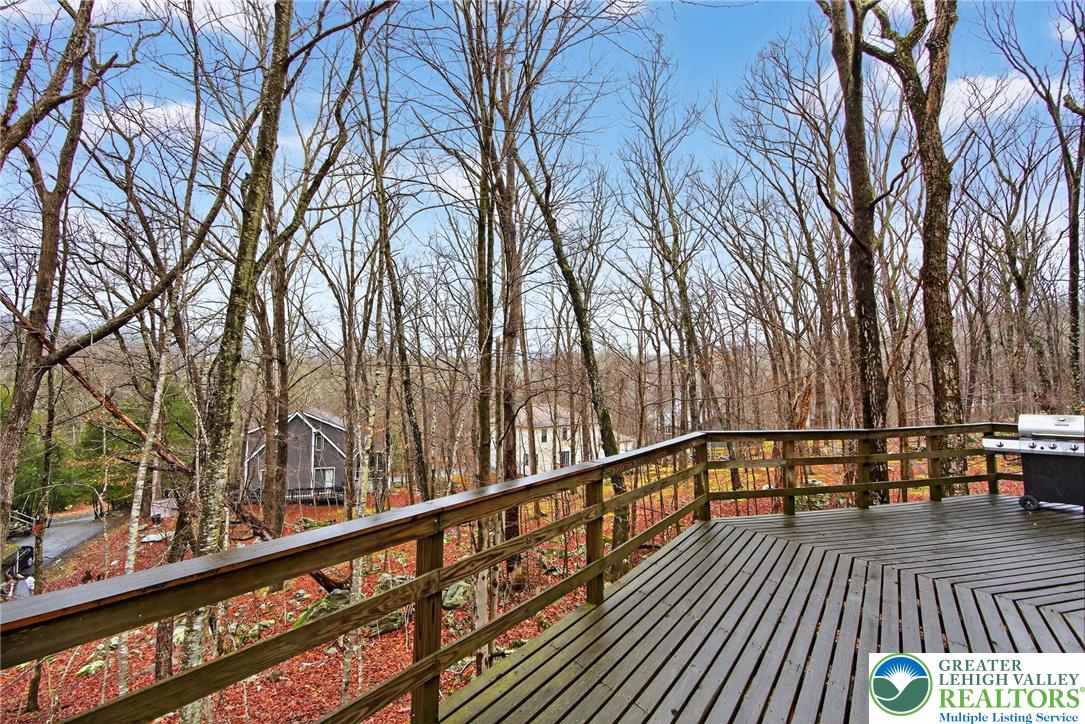 149 Regent Street Bushkill, PA 18324 - Photo 6 of 32 a view of balcony with wooden floor and fence