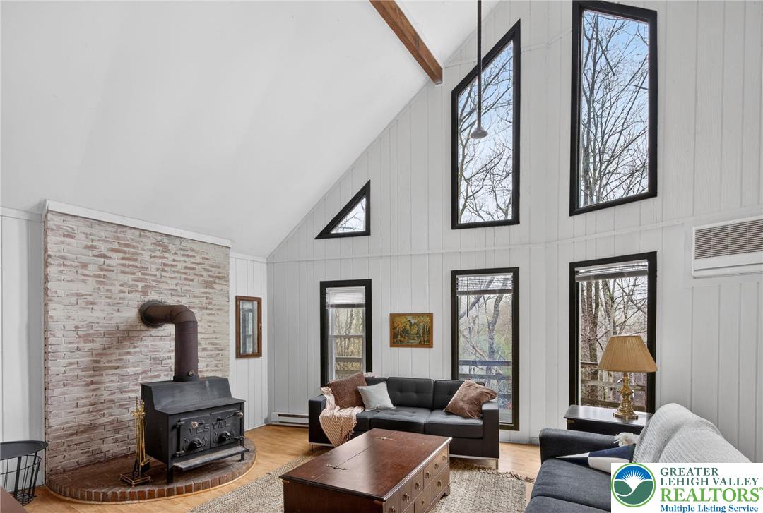 149 Regent Street Bushkill, PA 18324 - Photo 10 of 32 a living room with furniture and floor to ceiling windows