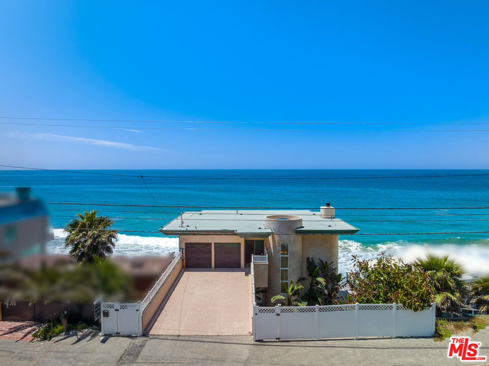 43250 Pacific Coast Highway Malibu, CA 90265 - Photo 2 of 21 a view of a patio with potted plants
