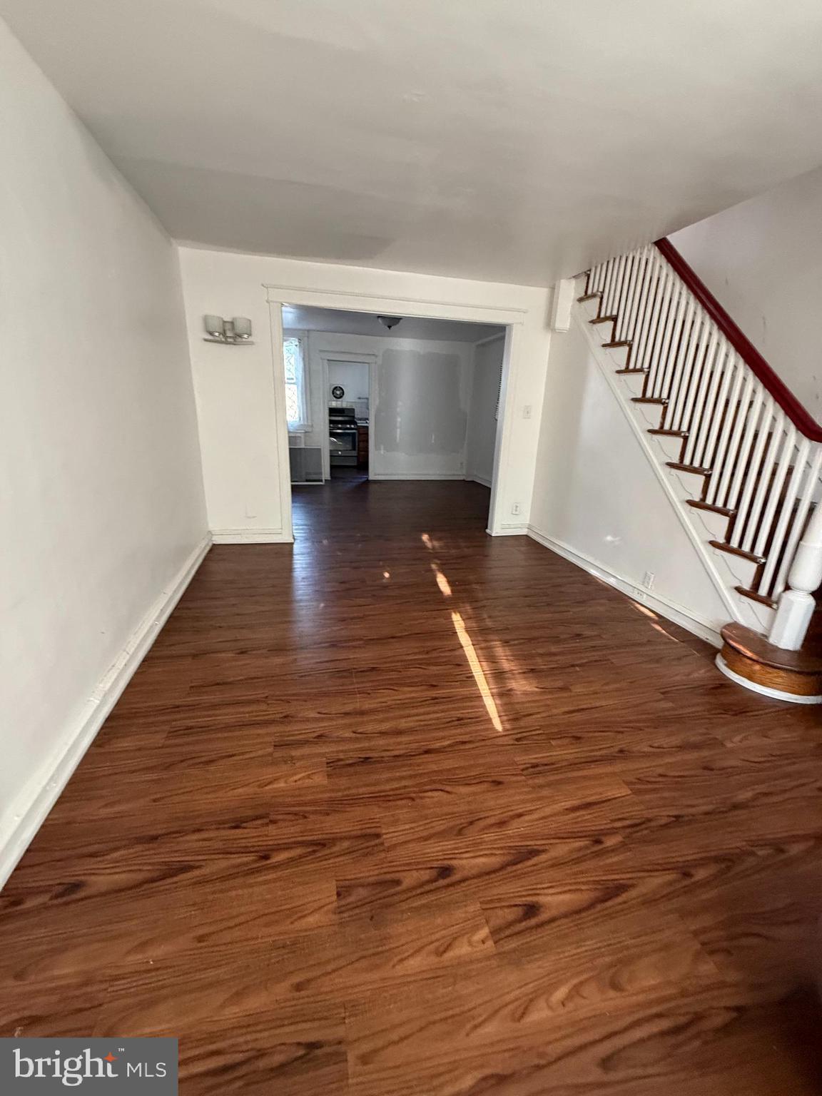 411 Timberlake Road Upper Darby, PA 19082 - Photo 1 of 15 a view of empty room with wooden floor