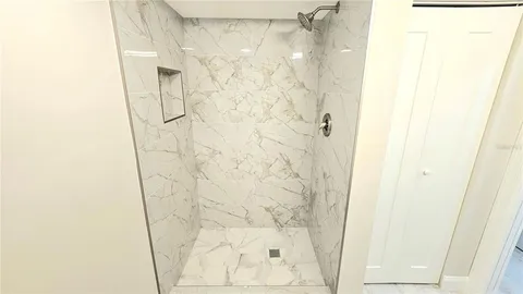 a view of kitchen with wooden floor