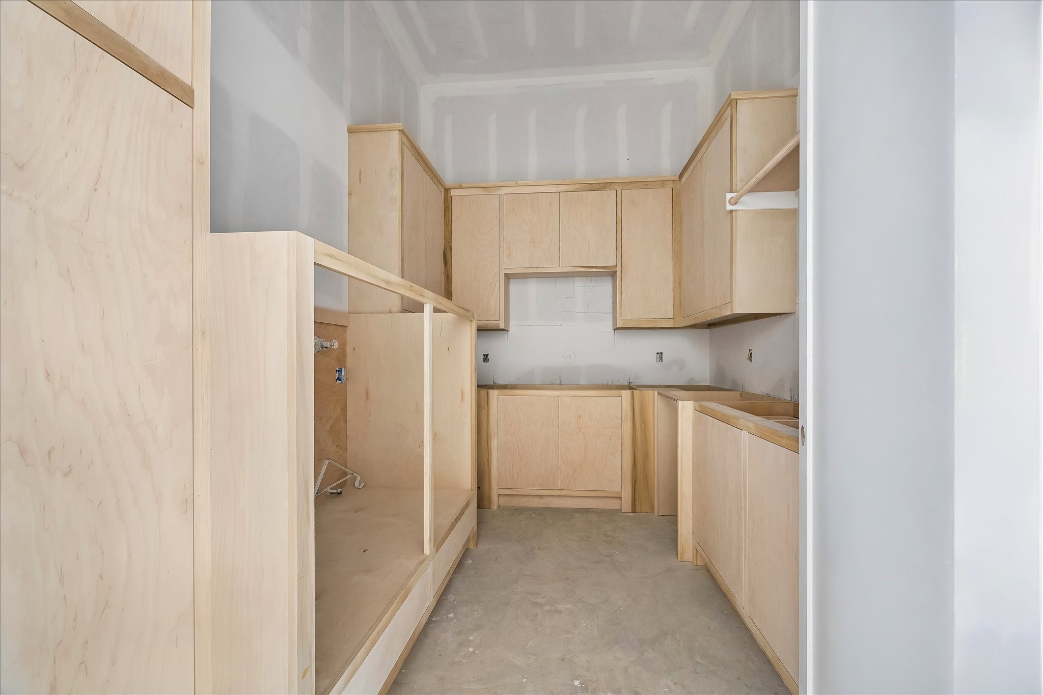 9050 Elizabeth Road Houston, TX 77055 - Photo 11 of 40 a kitchen with white cabinets and refrigerator