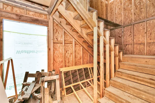 a view of a room with large windows