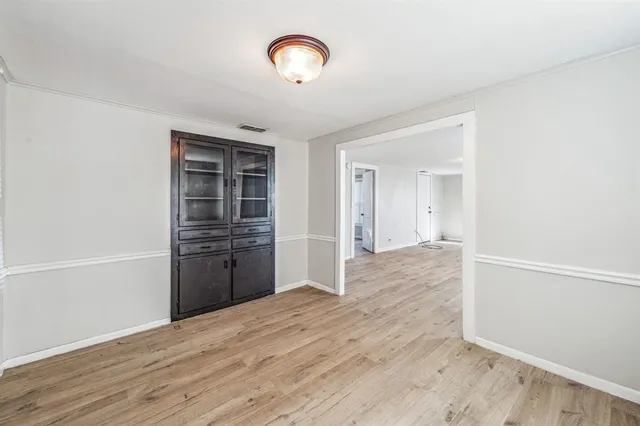 a kitchen with a stove a sink and a refrigerator