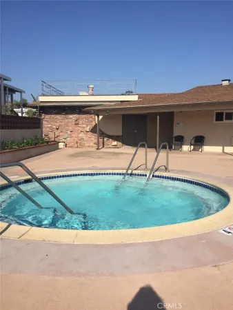 a view of backyard with a patio