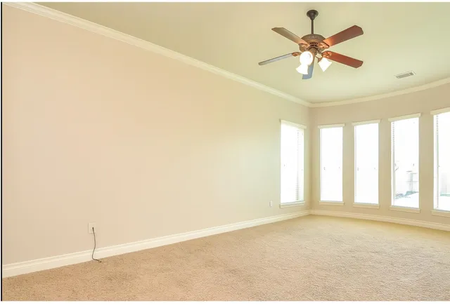 a bathroom with a granite countertop tub sink shower and mirror