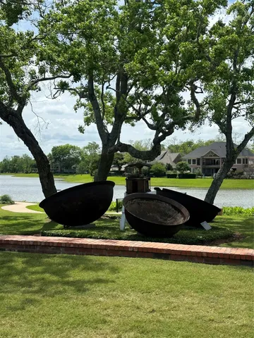 a view of a lake with a big yard