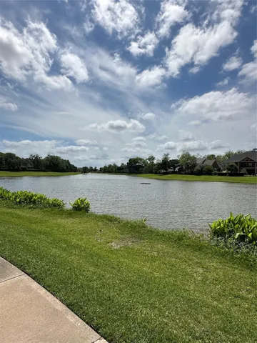 a view of swimming pool and mountain in back
