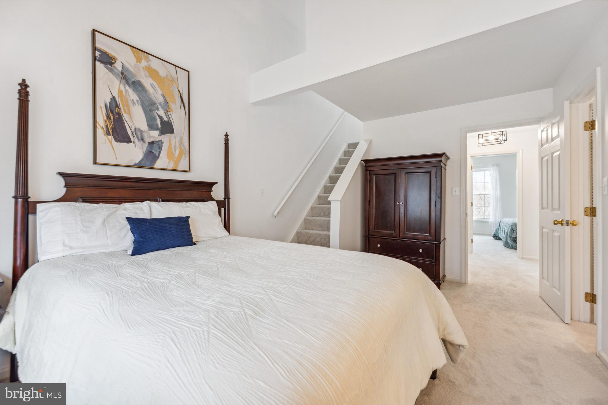 1232 Vintage Place Reston, VA 20194 - Photo 12 of 25 Primary bedroom suite with walk-in closet