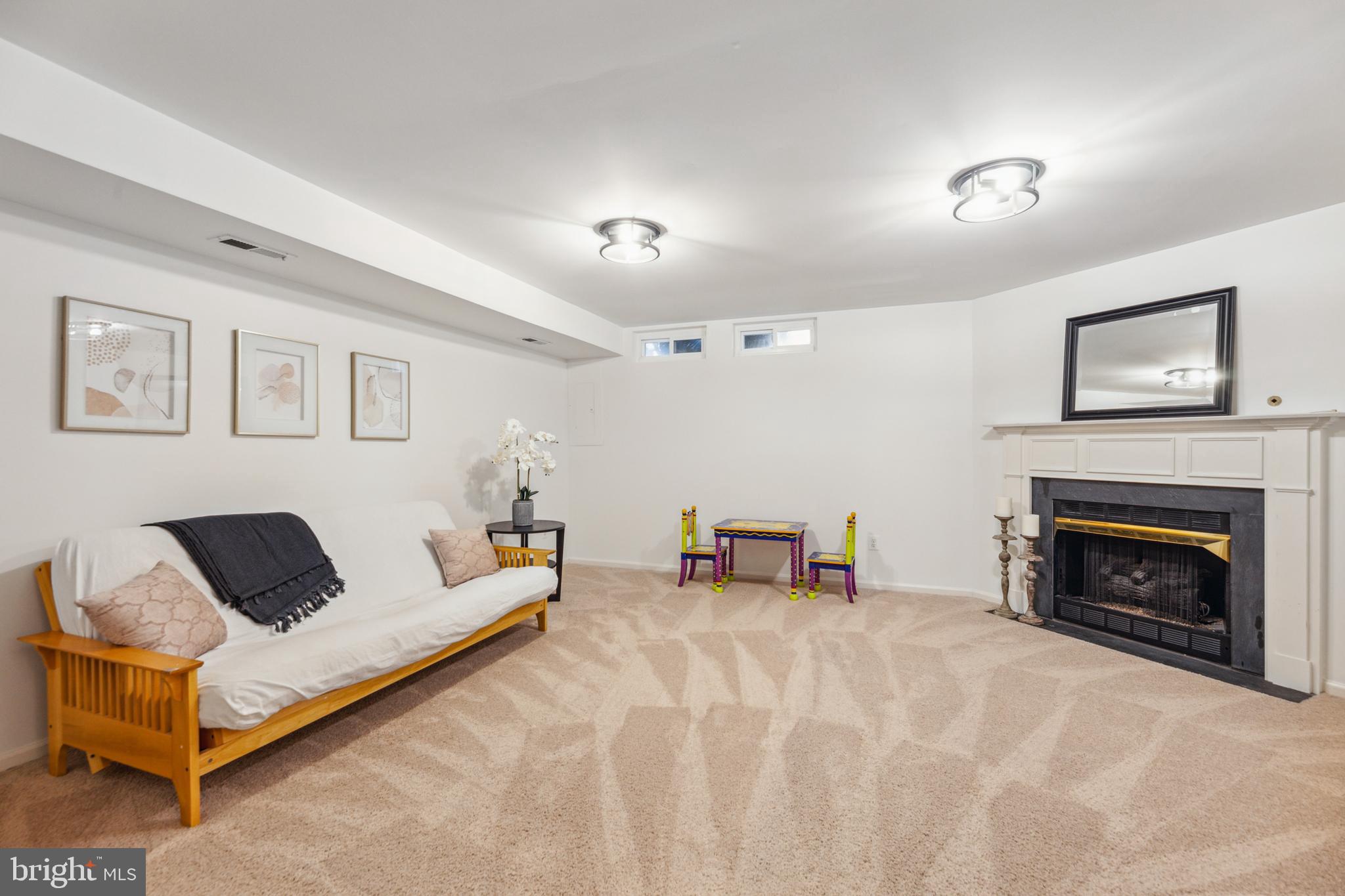 1232 Vintage Place Reston, VA 20194 - Photo 21 of 25 Spacious lower level den with fireplace