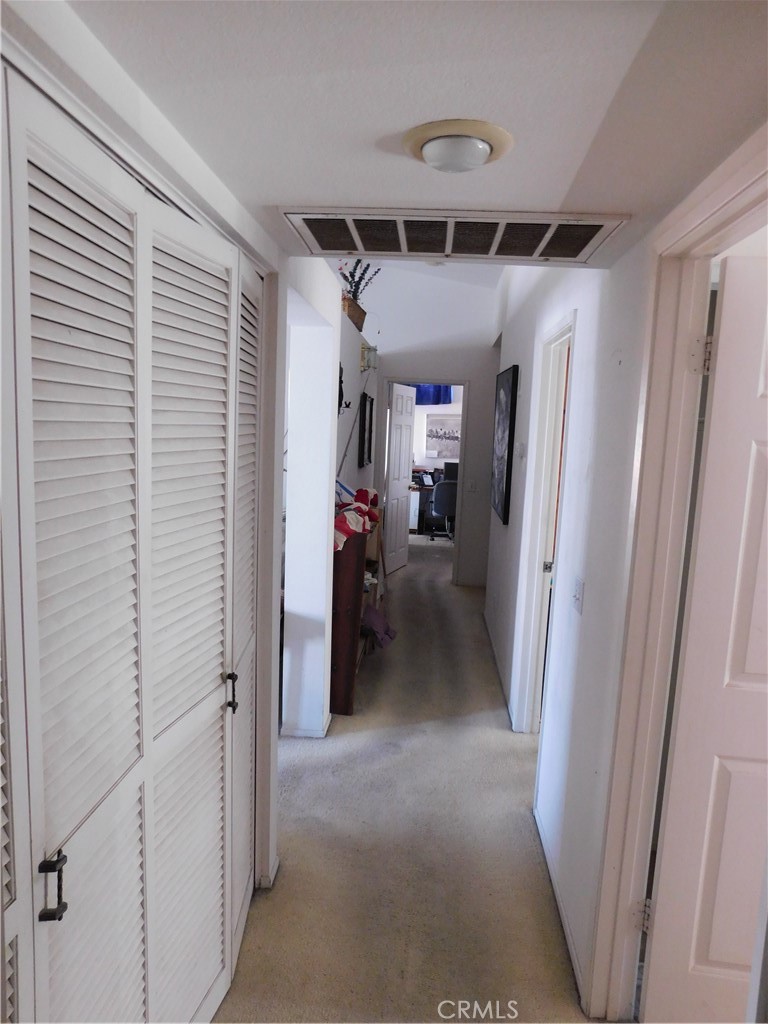 2368 Bayberry Way Hemet, CA 92545 - Photo 6 of 13 a view of a hallway view with furniture