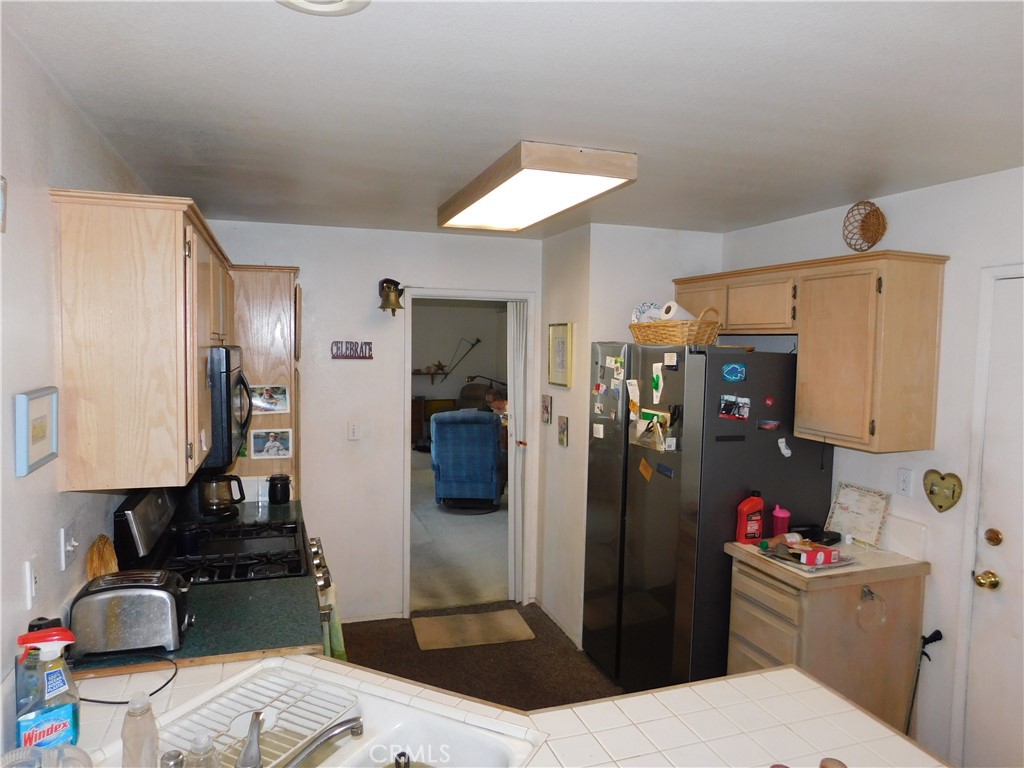 2368 Bayberry Way Hemet, CA 92545 - Photo 8 of 13 a room with a storage and utility