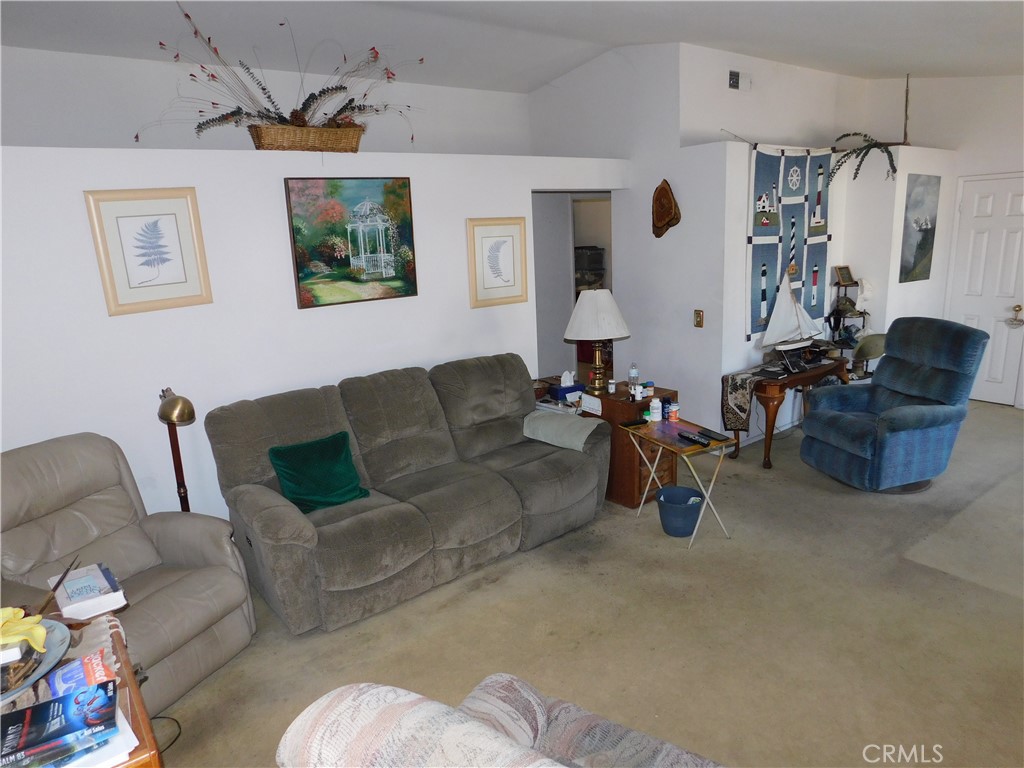 2368 Bayberry Way Hemet, CA 92545 - Photo 9 of 13 a living room with furniture and a couch