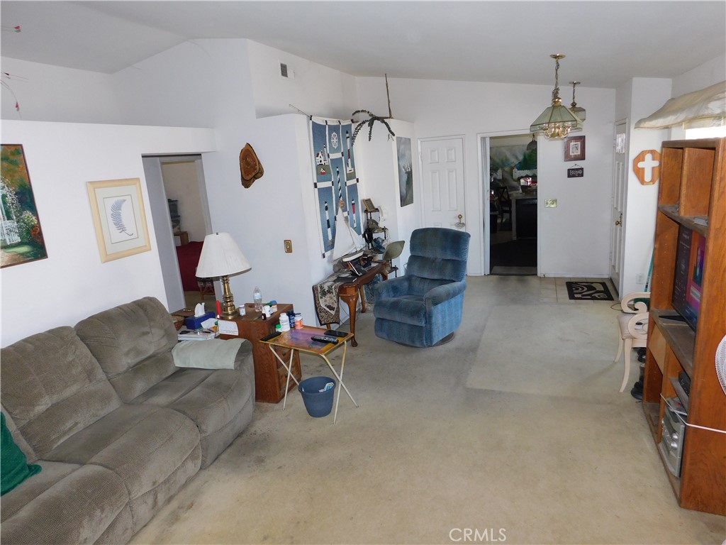 2368 Bayberry Way Hemet, CA 92545 - Photo 10 of 13 a living room with furniture and a flat screen tv