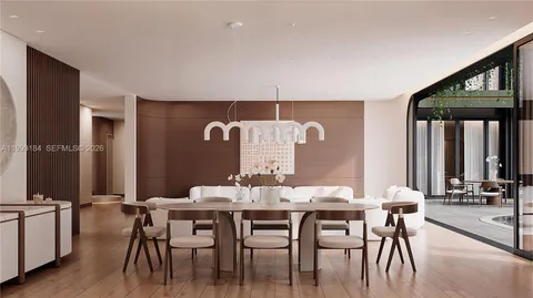 a living room with a couch and cabinets