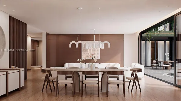 a living room with a couch and cabinets