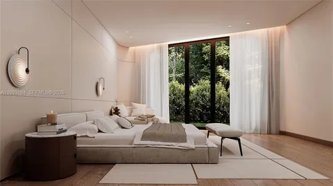 a bedroom with bed and glass door
