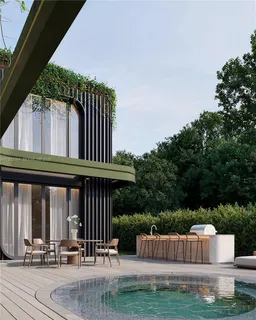 a view of swimming pool with deck and plants