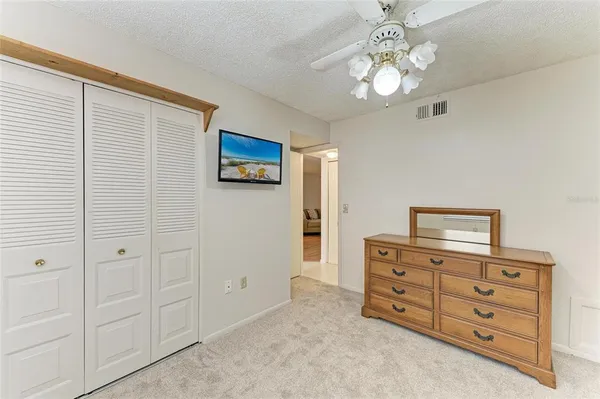 a view of a room that has a large window