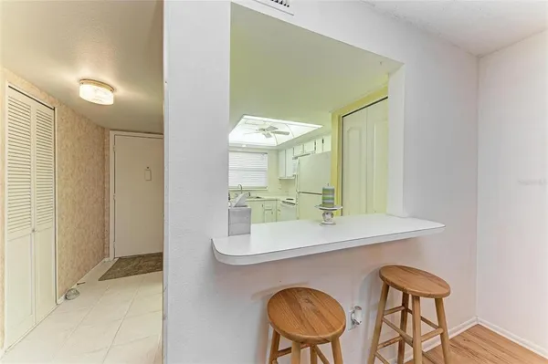 a room with a table and chairs