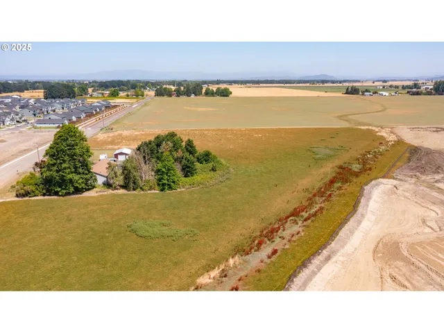 a view of an ocean and city