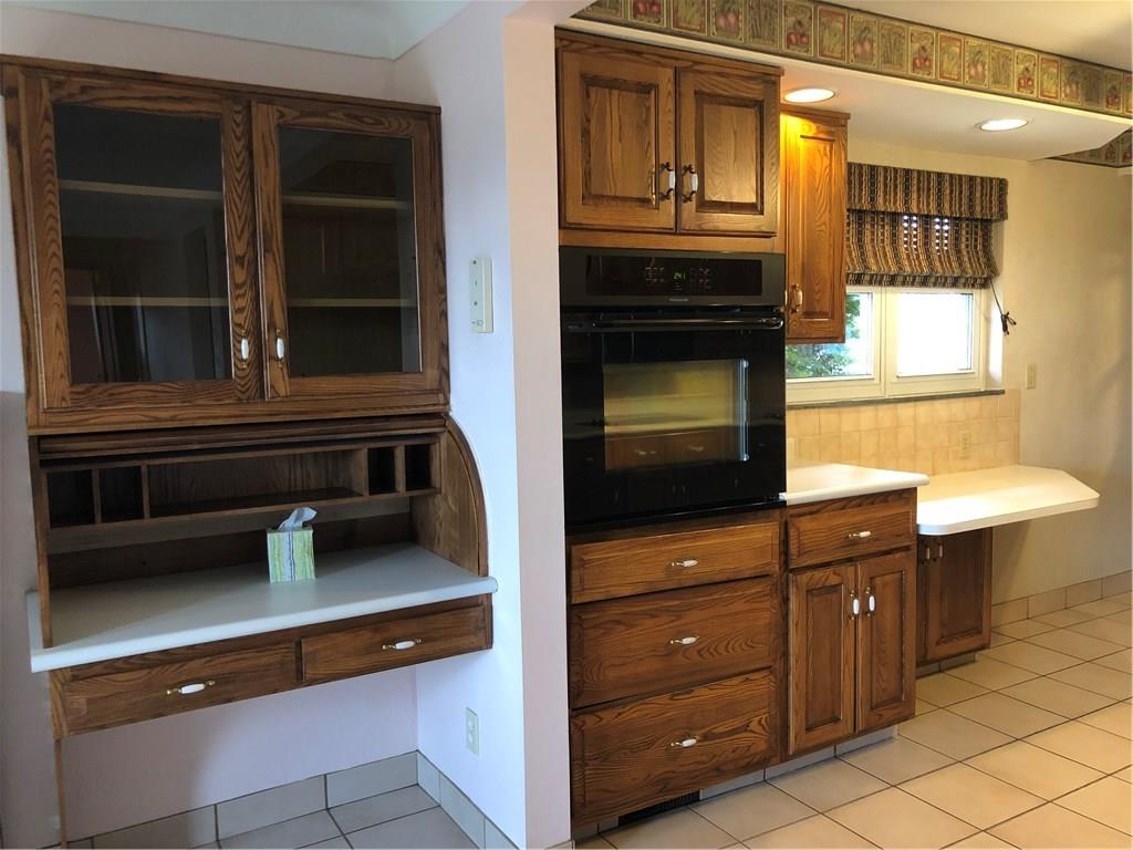 339 Bethel Road North Huntingdon, PA 15642 - Photo 9 of 25 DESK IN DINING AREA BUILT IN OVEN IN KITCHEN ALONG WITH A NOOK