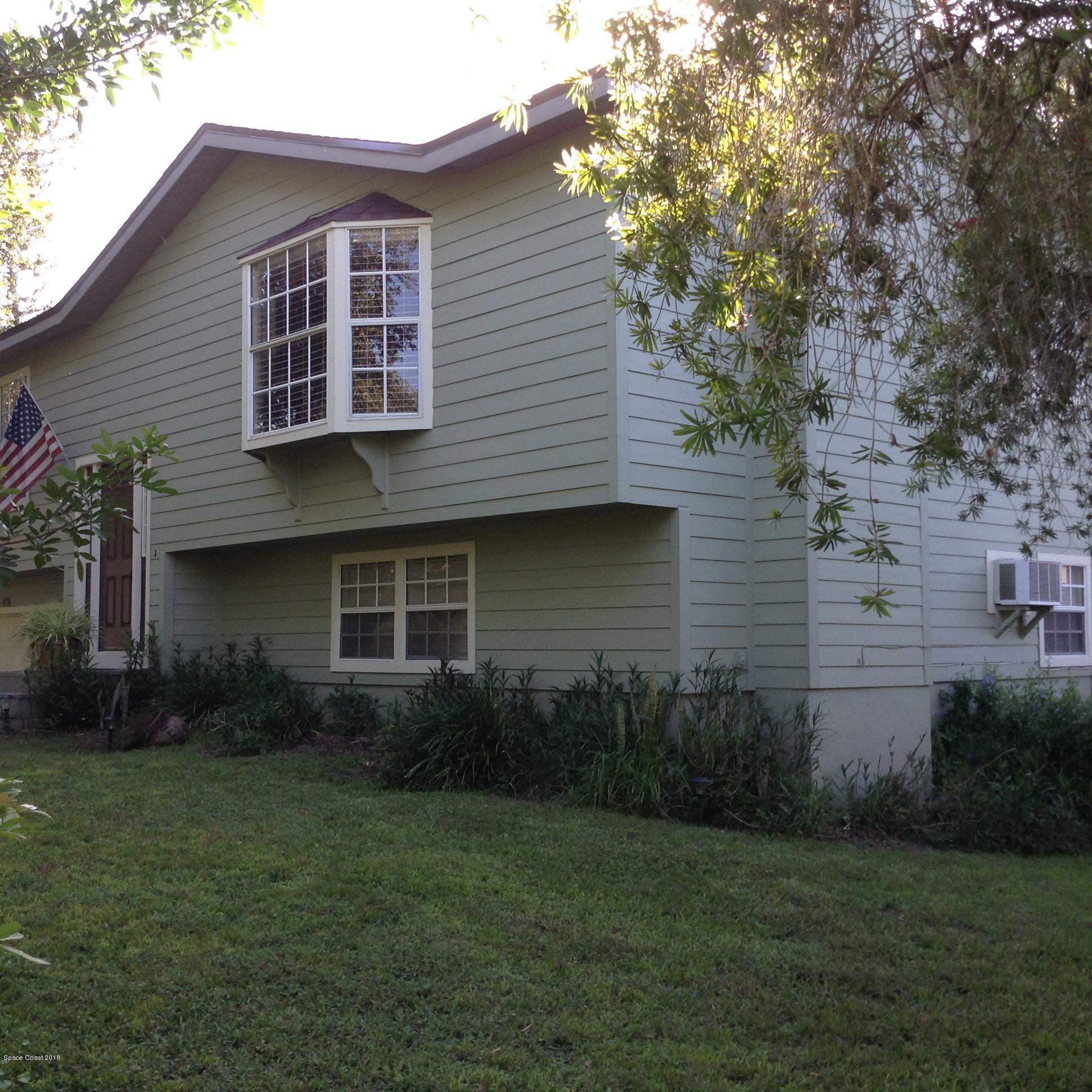 476 Warrington Road Southwest Palm Bay, FL 32908 - Photo 1 of 20 Front