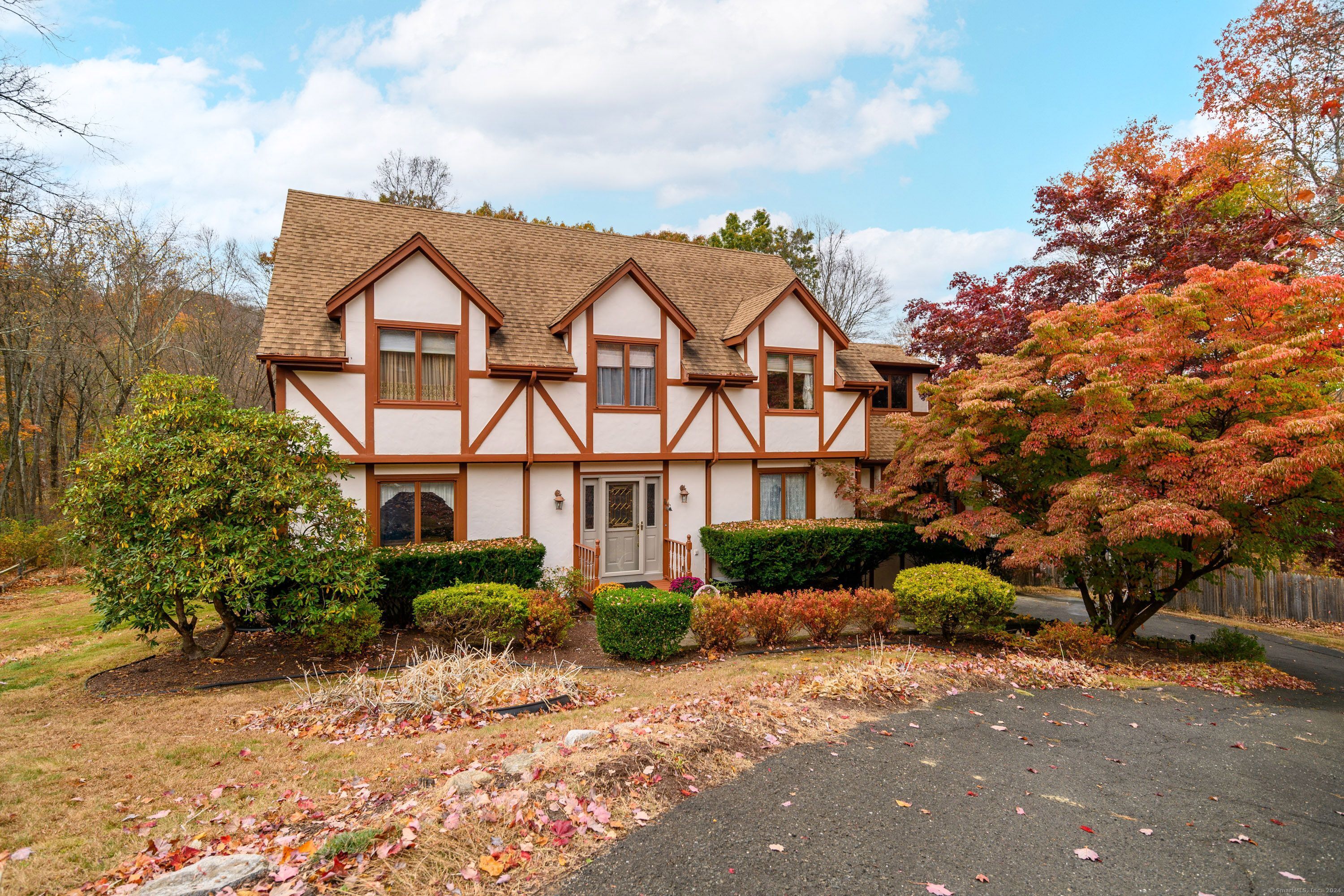 Welcome home to this exceptional gem in New Fairfield!