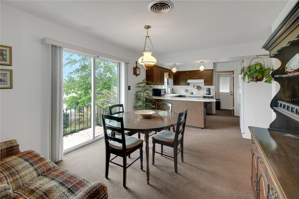 2214 Topping Place Eustis, FL 32726 - Photo 23 of 57 a dining room with furniture and window