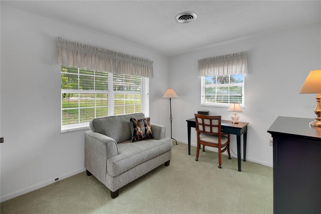 2214 Topping Place Eustis, FL 32726 - Photo 36 of 57 a living room with furniture and a window