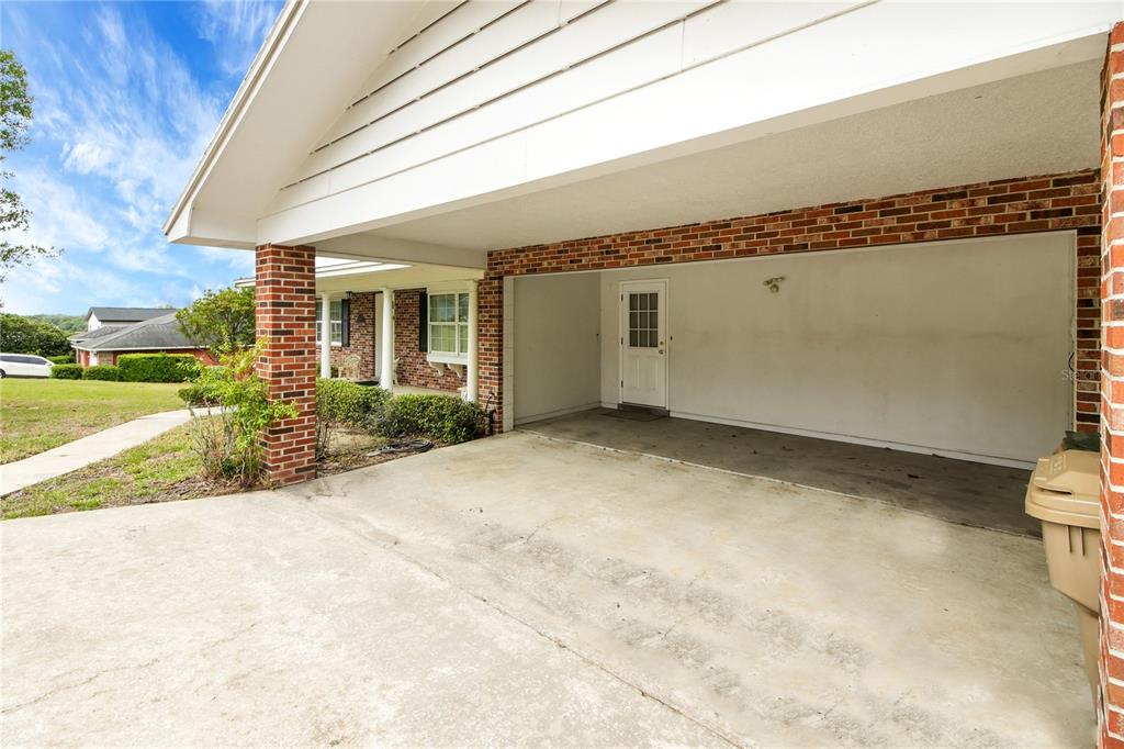 2214 Topping Place Eustis, FL 32726 - Photo 49 of 57 a view of a porch with a backyard
