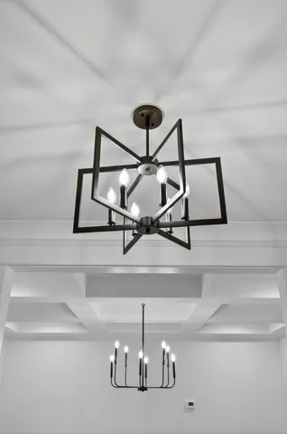 a view of bedroom with furniture and wooden floor