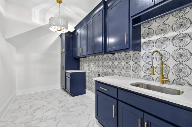 a white bath tub sitting in a bathroom