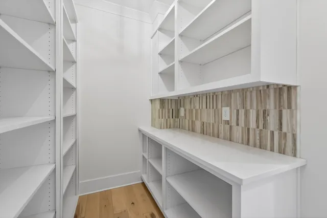 a view of an empty walk in closet
