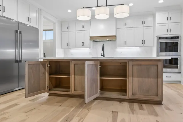 a bathroom with a sink and mirror