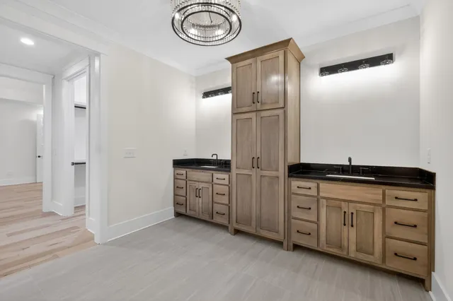 a picture of a bench in front of a house